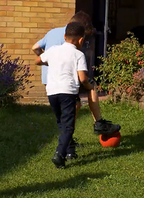 boys playing football at Just kidding afterschool club in Walthamstow